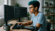 © Andrei Burakov - Young coder with blue hair and a bionic arm prosthesis sitting at a desk, focused on two monitors displaying code while wearing wireless earbuds