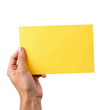 © nAot - A hand holding a blank yellow sticky note against a transparent background..