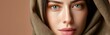 © BrandwayArt - Woman with green eyes and headscarf poses for portrait