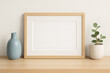 © Chrystine - 2:3 landscape horizontal picture frame mockup with mat for photos and art. Clean and neutral styling with blue accent vase and small houseplant.