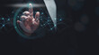 © Lahmz - Futuristic businessman touching virtual interface with glowing network connections. Innovation, digital technology, and data interaction concept in modern business.