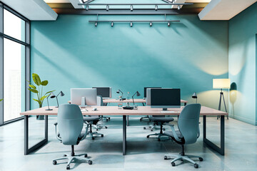 Fototapete - Modern empty office interior with desks, computers and chairs under skylight in contemporary business workspace with teal wall and clean design. 3D Rendering