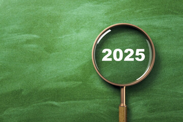 Aufkleber - Magnifying glass focusing on white 2025 text over clean green chalkboard background symbolizing research, study, and educational future concept. 3D Rendering