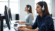 © Andriana Hoshko - Blurred photo of professional women working in a modern office. For customer service, support, or business communication context.