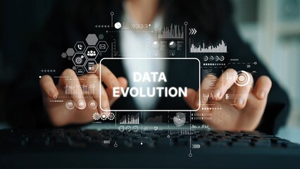 Poster - businesswoman typing on keyboard with data evolution concept and digital graphics in a modern office