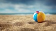 © Jane Kelly - Beach ball on sandy shore