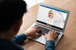 © InfiniteFlow - Doctor video call online by modish telemedicine software application for virtual meeting with patient