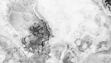 Aufkleber - A black and white photo of a marble wall with a swirl pattern. The wall appears to be made of marble and has a unique texture. The photo gives off a sense of elegance and sophistication
