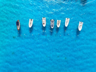 Wall Mural - vacation and leisure. seascape with motorboat. aerial view on fast boats on blue mediterranean sea a