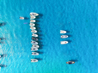 Wall Mural - vacation and leisure. seascape with motorboat. aerial view on fast boats on blue mediterranean sea a