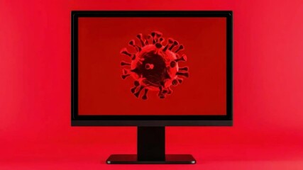 Poster - red background displaying virus graphic on computer screen with bold color contrast and modern desig