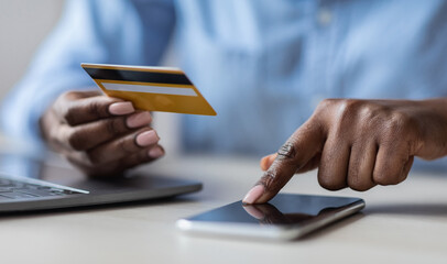 Poster - Unrecognizable Black Lady Browsing Mobile Banking App On Smartphone And Holding Credit Card, Paying Bills In Internet, Shopping Online, Transferring Money, Cropped Image, Closeup Shot