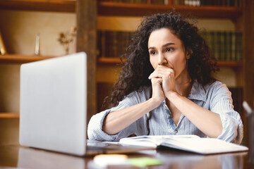 Aufkleber - Freelance Stress. Concerned female freelancer tired after work on laptop at home, having problems with project, sitting at desk and looking at computer, thinking about deadline and troubles