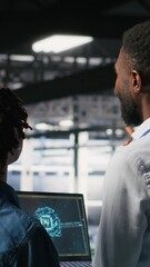 Poster - vertical video data center team on industrial platform collaborating to maintain servers using artif