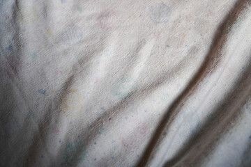 Poster - Delicate textile detail, featuring a subtle blend of colors. The woven texture and soft hues create an abstract and versatile visual for various design projects and backdrops.