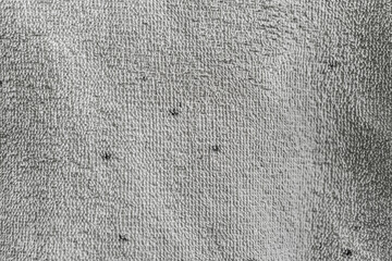 Poster - Close-up showcases the plush texture and intricate weave of a gray towel, ideal for backgrounds and designs. Details highlighting softness and absorbency offer versatility.