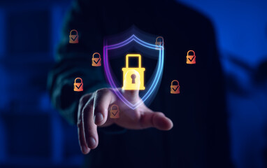 Leinwandbilder - Cybersecurity protection concept with a hand touching a glowing padlock and shield icon, representing data security, encryption, and secure digital access in a high-tech environment.