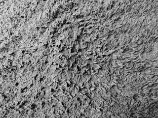 Poster - Abstract textile background offers a textured and monochrome visual, ideal for adding depth. Its cozy fibers evoke a sense of warmth and are perfect for design projects needing tactile elements.