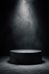 Wall Mural - dark, moody scene featuring a cylindrical pedestal illuminated by a single spotlight against a textu