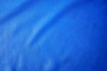 Poster - Detailed blue leather texture presents a tactile visual with subtle variations in tone. The surface is evenly lit, emphasizing its natural patterns and providing a versatile backdrop.
