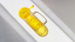 © yrabota - One Yellow colored glass cup with beautiful sunlight shadow, long shade on white background. Top view mug for tea and coffee with window shadow, minimal aesthetic top view summer concept, banner