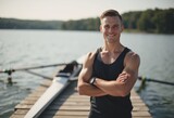 Senior rower smiling confidently on the dock beside his shell