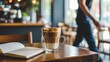 © Passion - Cozy café corner with latte and open notebook