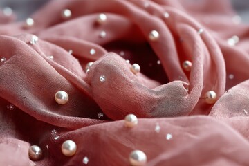 Poster - Delicate fabric draped with pearls and crystals in soft lighting creates an elegant atmosphere for accessories