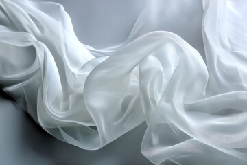 Poster - Delicate white fabric drapes softly on a neutral surface creating elegant folds and textures in natural light