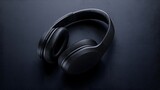 Black Wireless Over Ear Headphones on Dark Textured Surface