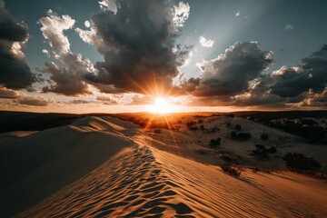Aufkleber - Stunning sunset over desert dunes with dramatic clouds enhances the tranquil landscape at golden hour
