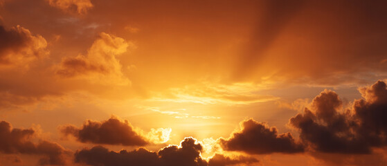 Poster - Golden sky at dawn with bright sunrise, dramatic clouds, and warm sunlight creating peaceful and inspiring morning atmosphere