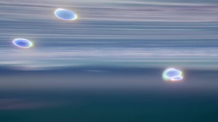 Poster - Abstract bubbles floating and rotating slowly in a blurred background  