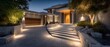 © Abian rasyid - Modern home exterior at night with illuminated pathway and landscaping.