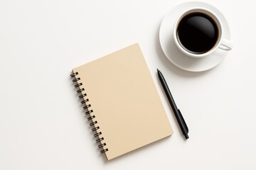 Poster - Beige spiral notebook, black pen, and cup of coffee on clean white background with copy space for business design or branding mockup concept.