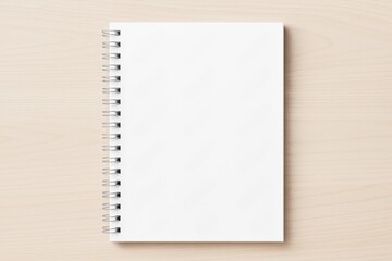 Poster - Spiral notebook with blank white pages placed on light wood background in top view, ideal for mockup, copyspace, and creative design concepts.