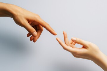 Aufkleber - Two human hands reaching toward each other with fingers nearly touching on soft light background, symbolizing connection and communication concept.