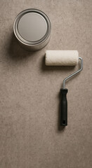 Poster - Preparation for Home Painting Project With a Roller and Can of Paint on a Neutral Surface
