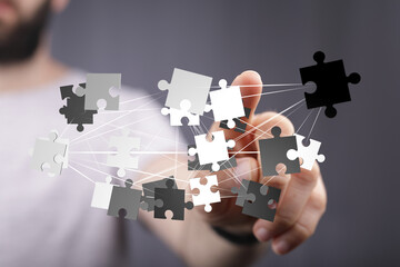 Aufkleber - Abstract image of puzzle pieces connecting, symbolizing teamwork, collaboration, and problem-solving.