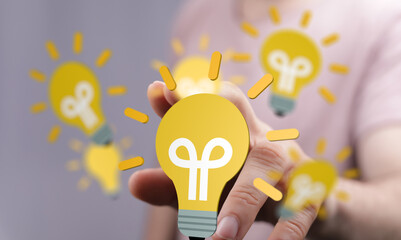 Poster - Person holding a digital lightbulb, symbolizing innovation, ideas, and solutions.