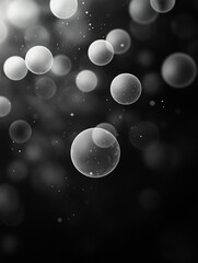 Poster - An abstract black and white image features a collection of translucent, overlapping bubbles of varying sizes. The bubbles are scattered across a dark background, creating a sense of depth and movement