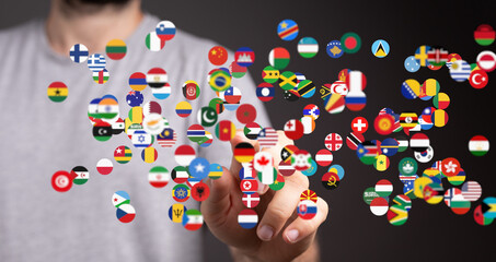 Leinwandbilder - Abstract image of a person connecting with various flags, symbolizing global networking and international relations.