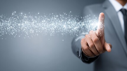 Poster - Innovation and Transformation - Businessperson's fingertip activating a stream of particles, symbolizing innovation and technological advancement