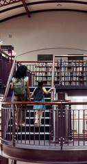 Poster - Library, child and woman with books for information, learning or knowledge for academic tutor. Study session, student and education with girl for scholarship, walking people and project support