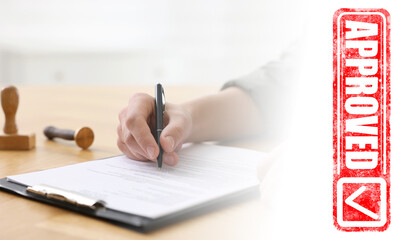 Fototapete - Man signing document at table and red stamp Approved, banner design