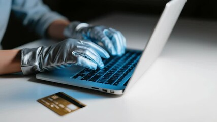 Poster - Person Using Laptop with Gloves and Credit Card Nearby