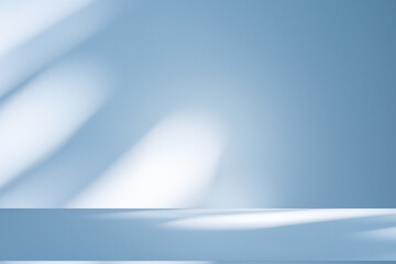 Poster - Wall interior background, studio and backdrops show products. with soft light shadow from window color blue and white. background for text insertion and presentation of product	