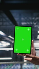 Poster - Vertical video Military personnel overseeing AI computing operations on isolated screen tablet in high tech server facility. Army tech experts using chroma key device to oversee communication systems
