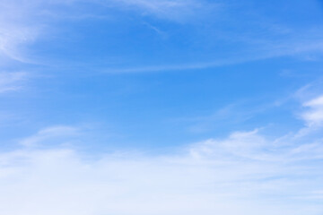 Wall Mural - fantastic soft white clouds against blue sky and copy space horizontal shape. web banner.website hea