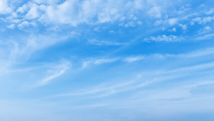 Wall Mural - fantastic soft white clouds against blue sky and copy space horizontal shape. web banner.website hea